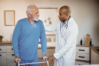 doctor assisting patient